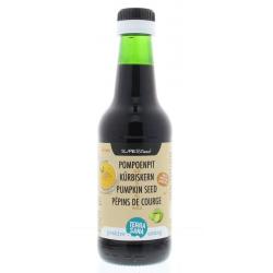 Raw pompoenpit olie in glas